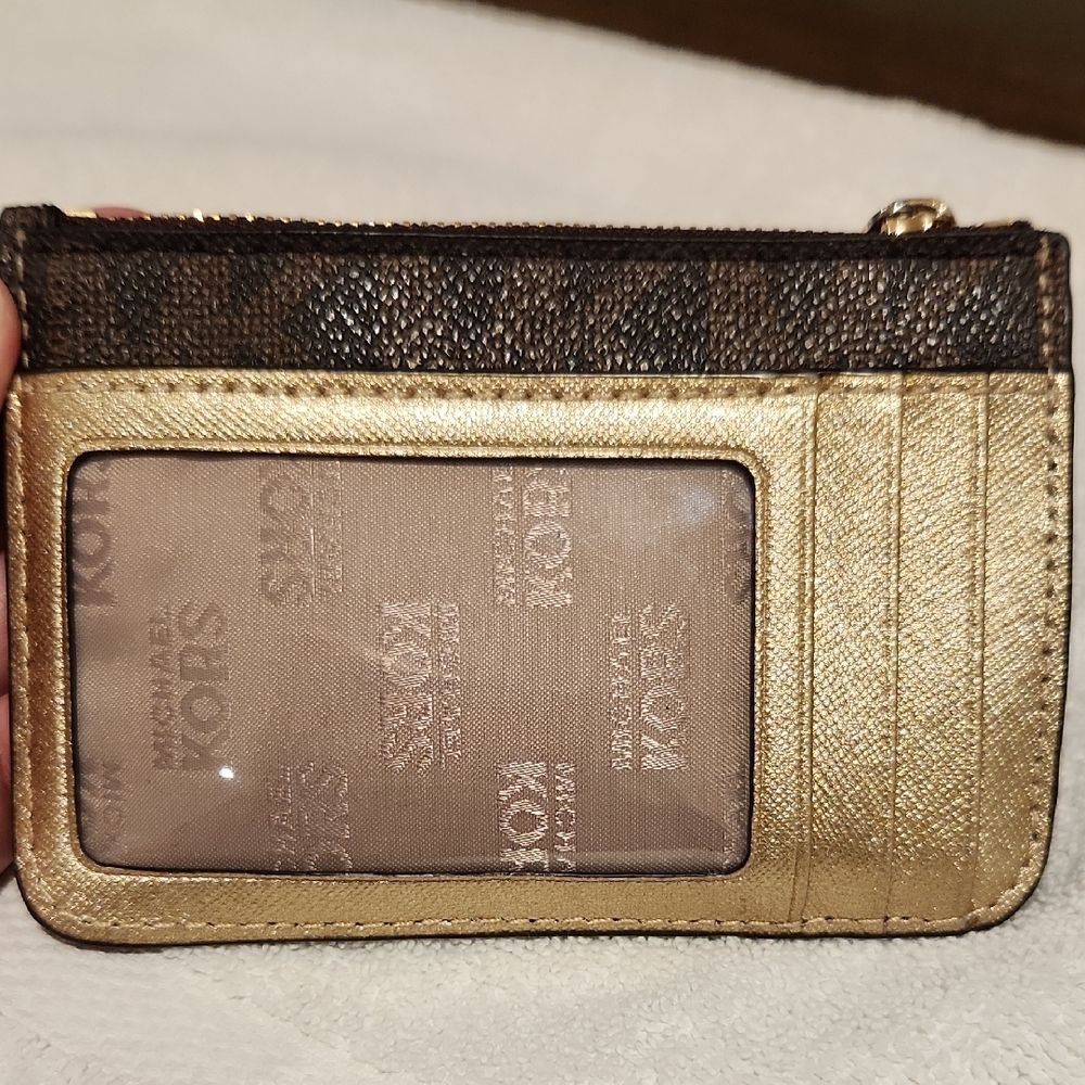 Michael Kors Black Wristlet with Rocket and Star Design - Picture 2 of 7